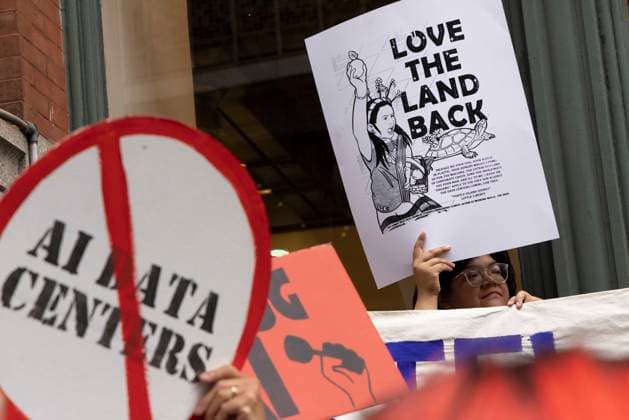 September 21, 2026: A coalition of climate organizations led by Climate Defenders hold an anti AI rally outside the offices of OpenAI in Lower Manhattan s Soho neighborhood at the start of Climate Week. Attendees hold signs that read LOVE THE LAND BACK circle slash (no) AI DATA CENTERS. Demonstrators denounce OpenAIÃ¢â‚¬â ¢s massive data center buildout for causing higher utility bills, pollution, depleting water supplies and for worsening the climate crisis by creating a larger demand for fossil fuels. Protesters call for elected government officials to regulate Artificial Intelligence and pass data center moratoriums to protect communities and the planet from Big Tech. - ZUMAr174 20260921_znp_r174_027 Copyright: xGinaxMxRandazzox