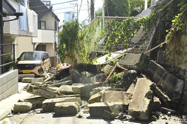 Typhoon Dujuan causes landslide damage in Tokyo TOKYO, JAPAN - SEPTEMBER 22 : Debris from a collapsed residential retaining wall blocks a narrow street and surrounds a damaged vehicle following heavy rain brought by Typhoon Dujuan in the Naka-Meguro area of Tokyo, Japan, September 22, 2026. David Mareuil Anadolu Tokyo Japan. Editorial use only. Please get in touch for any other usage.  Copyright: x2026xAnadoluxDavidxMareuilx