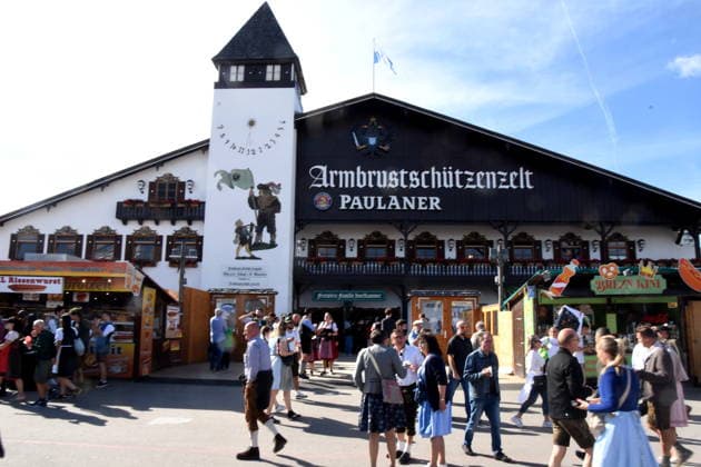 Munich, September 21, 2026: Thersienwiesn Oktoberfest visitors in front of the Paulaner Crossbowmen s Tent. Photo: Munich