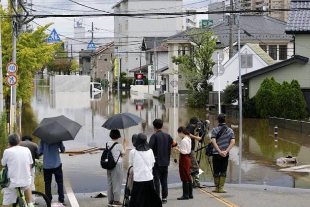 Aftermath of Typhoon Dujuan A street remains flooded in Sakura in Chiba Prefecture, eastern Japan, on Sept. 22, 2026, following heavy rain caused by Typhoon Dujuan.  A14AA0005628218P