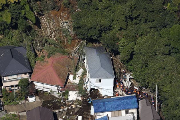 Aftermath of Typhoon Dujuan Photo taken from a Kyodo News helicopter on Sept. 22, 2026, shows homes partially buried by a mudslide in Miura in Kanagawa Prefecture, eastern Japan, following heavy rain caused by Typhoon Dujuan.  A14AA0005628225P