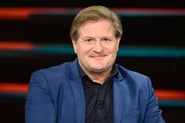 Michael Bröcker, journalist, 09 26, Michael Bröcker on September 20, 2026, on *Markus Lanz*, ZDF TV, television, talk show, Germany, German, German man, table, briefings, editor-in-chief, journalism, German journalism, cross-cutting, portrait, smiling