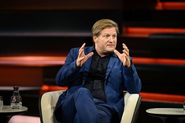 Michael Bröcker, Journalist, 09 26, Michael Bröcker on September 20, 2026, on *Markus Lanz*, ZDF TV, talk show, Germany, German, German man, table, briefings, editor-in-chief, journalism, German journalism, sitting sideways, speaking, gesturing
