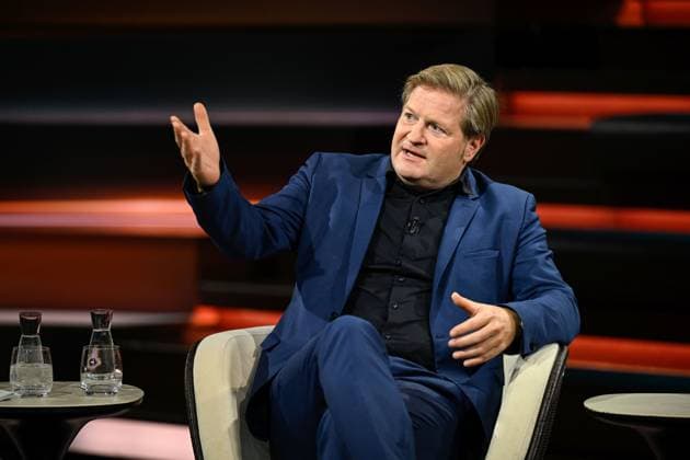 Michael Bröcker, Journalist, 09 26, Michael Bröcker on September 20, 2026, on *Markus Lanz*, ZDF TV, talk show, Germany, German, German man, table, briefings, editor-in-chief, journalism, German journalism, sitting sideways, speaking, gesturing