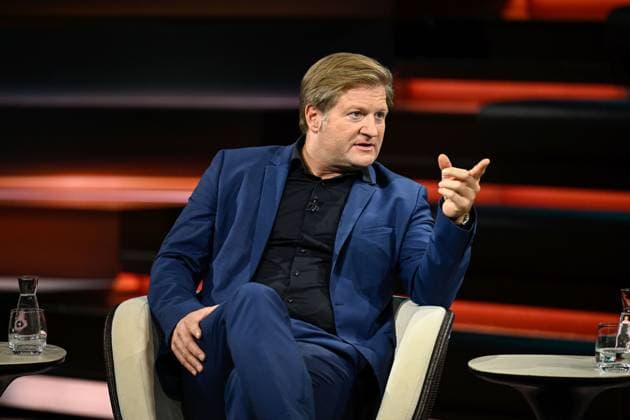 Michael Bröcker, Journalist, 09 26, Michael Bröcker on September 20, 2026, on *Markus Lanz*, ZDF TV, talk show, Germany, German, German man, table, briefings, editor-in-chief, journalism, German journalism, sitting sideways, speaking, gesturing