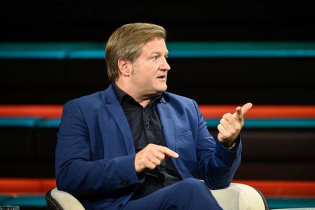 Michael Bröcker, Journalist, 09 26, Michael Bröcker on September 20, 2026, on *Markus Lanz*, ZDF TV, talk show, Germany, German, German man, table, briefings, editor-in-chief, journalism, German journalism, sitting sideways, speaking, gesturing