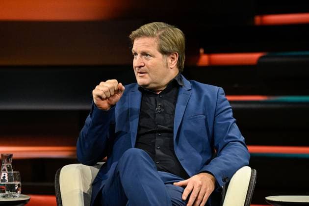 Michael Bröcker, Journalist, 09 26, Michael Bröcker on September 20, 2026, on *Markus Lanz*, ZDF TV, talk show, Germany, German, German man, table, briefings, editor-in-chief, journalism, German journalism, sitting sideways, speaking, gesturing