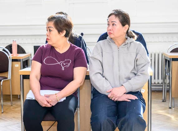 The trial in a major case involving the smuggling of migrants from Asia through the Czech Republic to Germany began today, on September 22, 2026, at the District Court in Litomerice, Czech Republic. There are 13 defendants. One of the defendants, described by the prosecutor as the main organiser of the migrant smuggling operation, is in custody. The group smuggled at least 63 refugees. If convicted, the defendants face between two and eight years in prison. Two of defendants are in the front row. (CTKxPhoto OndrejxHajek) CTKPhotoP2026092202760  CTKPhotoP2026092202760
