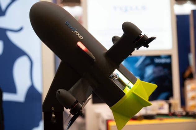 Model of a drone; the manufacturer is showcasing a special release mechanism designed for dropping objects at the EUDEX Euro Defense Expo on September 22, 2026, at the Essen Exhibition Center in Germany