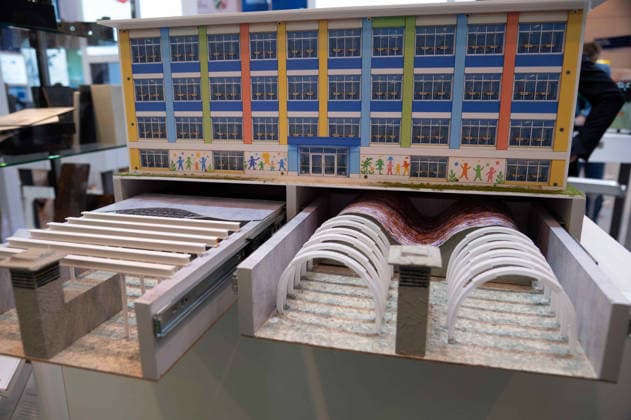 Model of a school building with shelters in the basement; the manufacturer is showcasing the construction and retrofitting of bunker facilities here at the EUDEX Euro Defense Expo on September 22, 2026, at the Essen Exhibition Center in Germany