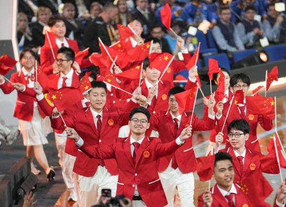 (260922) -- SHANGHAI, Sept. 22, 2026 -- Members of Chinese delegation attend the opening ceremony of the 48th WorldSkills Competition in east China s Shanghai, Sept. 22, 2026. The 48th WorldSkills Competition opened in Shanghai on Tuesday evening, with 1,385 competitors from 68 countries and regions vying in 64 skill events. ) CHINA-SHANGHAI-WORLDSKILLS COMPETITION-OPENING CEREMONY (CN) RenxPengfei 