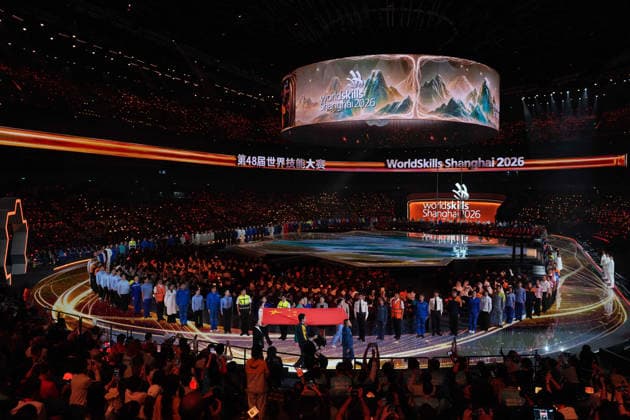 (260922) -- SHANGHAI, Sept. 22, 2026 -- The Chinese national flag is carried during the opening ceremony of the 48th WorldSkills Competition in east China s Shanghai, Sept. 22, 2026. The 48th WorldSkills Competition opened in Shanghai on Tuesday evening, with 1,385 competitors from 68 countries and regions vying in 64 skill events. ) CHINA-SHANGHAI-WORLDSKILLS COMPETITION-OPENING CEREMONY (CN) RenxPengfei 
