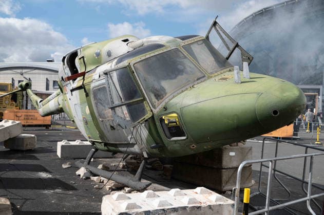 Model of a crashed helicopter, burned out, wreck, crash, accident, EUDEX Euro Defense Expo, on September 22, 2026, at Messe Essen, Germany