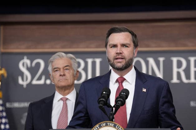 Vice President JD Vance speaks as Mehmet Oz, Administrator of the US Centers for Medicare and Medicaid Services, listens at a news conference on Medicare at the Eisenhower Executive Office Building at the White House in Washington DC on September 22, 2026.  WAX20260922902 YurixGripas