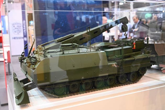 The Buffalo engineering tank, a model on display in a glass case, mounted on a model of a Schützenpanzer, at the Rheinmetall booth at the EUDEX Euro Defense Expo on September 22, 2026, at Messe Essen in Germany