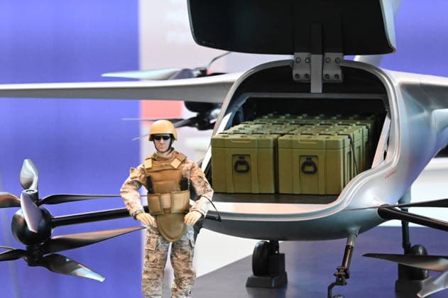 Model of a transport drone, transport drone, with a soldier figure in front of it, EUDEX Euro Defense Expo, on September 22, 2026, at Messe Essen, Germany