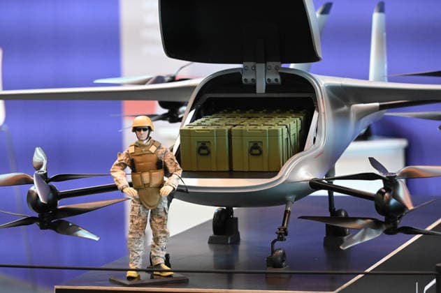 Model of a transport drone, transport drone, with a soldier figure in front of it, EUDEX Euro Defense Expo, on September 22, 2026, at Messe Essen, Germany