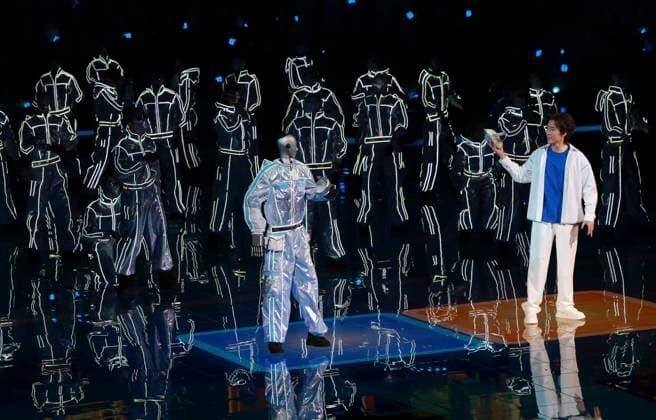 (260922) -- SHANGHAI, Sept. 22, 2026 -- People and robots perform during the opening ceremony of the 48th WorldSkills Competition in east China s Shanghai, Sept. 22, 2026. The 48th WorldSkills Competition opened in Shanghai on Tuesday evening, with 1,385 competitors from 68 countries and regions vying in 64 skill events. ) CHINA-SHANGHAI-WORLDSKILLS COMPETITION-OPENING CEREMONY (CN) DingxHaitao 