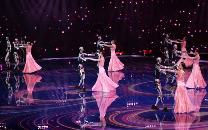 (260922) -- SHANGHAI, Sept. 22, 2026 -- People and robots perform during the opening ceremony of the 48th WorldSkills Competition in east China s Shanghai, Sept. 22, 2026. The 48th WorldSkills Competition opened in Shanghai on Tuesday evening, with 1,385 competitors from 68 countries and regions vying in 64 skill events. ) CHINA-SHANGHAI-WORLDSKILLS COMPETITION-OPENING CEREMONY (CN) DingxHaitao 