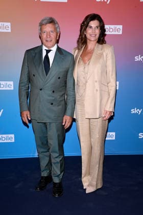 IPA88843090 - Milan, Evening Event to Launch the New Sky Mobile - Ezio Maria Simonelli with his wife Silvia  Copyright: xAlbertoxTerenghix xComi Terenghix IPA88843090