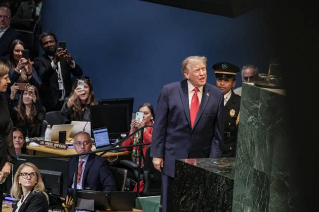 September 22, 2026, New York, New York, United States: US President DONALD TRUMP mouths something to the Secretary General as he walks to the podium as he is about to address the General Debate of the 81st UN General Assembly. Trump set out his administrationÃ¢â‚¬â ¢s priorities, focusing on Iran and nuclear proliferation, terrorism and drug cartels, migration, national sovereignty and US military power. He also rejected international efforts to establish global governance over artificial intelligence and defended his administrationÃ¢â‚¬â ¢s approach to US security and foreign policy. New York United States - ZUMAo116 20260922_znp_o116_044 Copyright: xBiancaxOterox