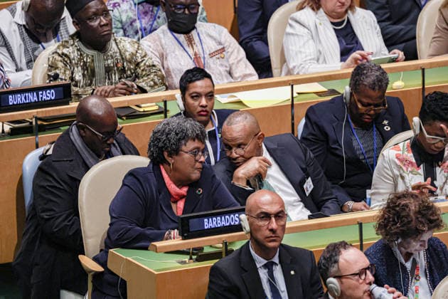 September 22, 2026, New York, New York, United States: Barbados Prime Minister MIA MOTTLEY speaks with Barbados Permanent Representative to the UN FRANCOIS JACKMAN during US President DONALD TRUMPÃ¢â‚¬â ¢s address to the 81st UN General Assembly. New York United States - ZUMAo116 20260922_znp_o116_056 Copyright: xBiancaxOterox