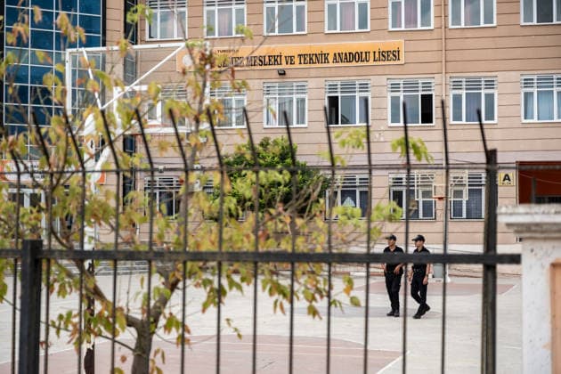 September 22, 2026, Manisa, Turkey: Police officers stand guard outside the high school following a shooting. Police maintained security measures around a high school in Turgutlu, in Turkey™s western Manisa province, following a shooting that left 11 people injured. The Turkish Interior Minister and Education Minister addressed the media following the incident. Manisa Turkey - ZUMAs197 20260922_aaa_s197_446 Copyright: xMuratxKocabasx