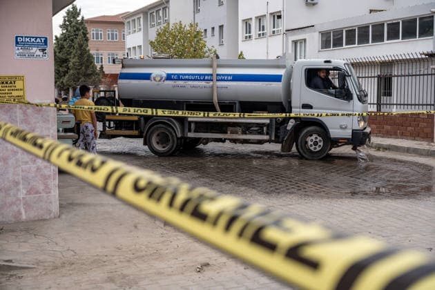 September 22, 2026, Manisa, Turkey: A municipal cleaning vehicle cleans the scene of the shooting. Police maintained security measures around a high school in Turgutlu, in Turkey™s western Manisa province, following a shooting that left 11 people injured. The Turkish Interior Minister and Education Minister addressed the media following the incident. Manisa Turkey - ZUMAs197 20260922_aaa_s197_474 Copyright: xMuratxKocabasx