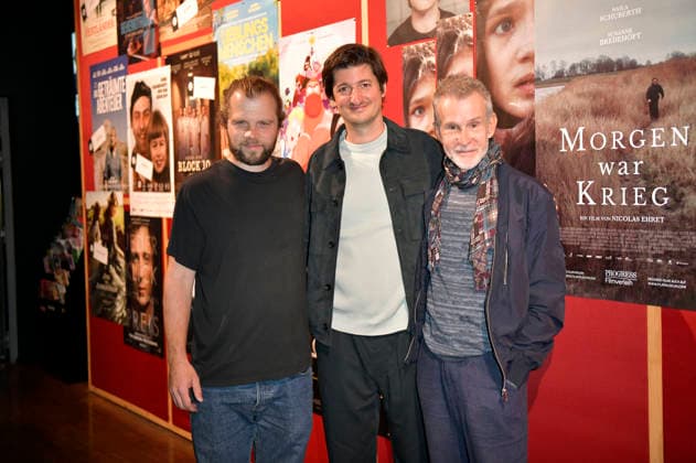 Fabian Gamper, Nicolas Ehret, and Ulrich Matthes at the premiere of the movie *Morgen war Krieg* at the Delphi Lux in Berlin, September 22, 2026 Foto:xM.xBehrensx xFuturexImagex krieg_6923