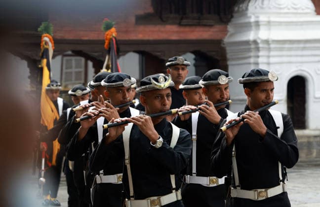 September 23, 2026, Kathmandu, Nepal: Members of Guruju Paltan play flute during the procession to erect a wooden pole Indradhwoj to mark the beginning of the Indrajatra Festival at Hanumandhoka Durbar Square in Kathmandu, Nepal on September 23, 2026. Nepali celebrate the Indra Jatra festival to worship Indra, the god of rain according to the Hindu myth and to mark the end of monsoon season. Kathmandu Nepal - ZUMAs233 20260923_zap_s233_006 Copyright: xSunilxSharmax