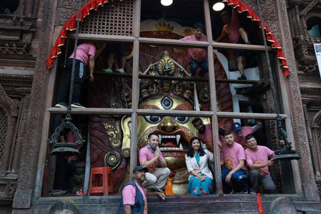 September 23, 2026, Kathmandu, Nepal: Acting Mayor of Kathmandu Metropolitan City, Sunita Dangol (C) and other attendants offer prayers to Swet Bhairav as it is opened for Indrajatra festival at Hanumandhoka Durbar Square in Kathmandu, Nepal on September 23, 2026. Nepali celebrate the Indra Jatra festival to worship Indra, the god of rain according to the Hindu myth and to mark the end of monsoon season. Kathmandu Nepal - ZUMAs233 20260923_zap_s233_004 Copyright: xSunilxSharmax