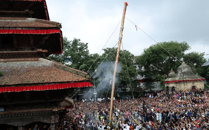 September 23, 2026, Kathmandu, Nepal: Nepali people erect a wooden pole Yosin or Indradhoj to mark the beginning of the Indrajatra Festival at Hanumandhoka Durbar Square in Kathmandu, Nepal on September 23, 2026. Nepali celebrate the Indra Jatra festival to worship Indra, the god of rain according to the Hindu myth and to mark the end of monsoon season. Kathmandu Nepal - ZUMAs233 20260923_zap_s233_011 Copyright: xSunilxSharmax