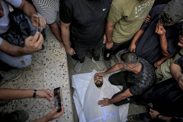 Two Palestinians killed in Israeli attack in Gaza GAZA CITY, GAZA, PALESTINE - SEPTEMBER 23: (EDITOR S NOTE: Image depicts death) Bodies of two Palestinians, killed in an Israeli attack in the Al-Nafaq area, are taken to the morgue at Al-Shifa Hospitalfor funeral preparations in Gaza City, Gaza, Palestine on September 23, 2026. Saeed M. M. T. Jaras Anadolu Gaza City Gaza. Editorial use only. Please get in touch for any other usage.  Copyright: x2026xAnadoluxSaeedxM.xM.xT.xJarasx
