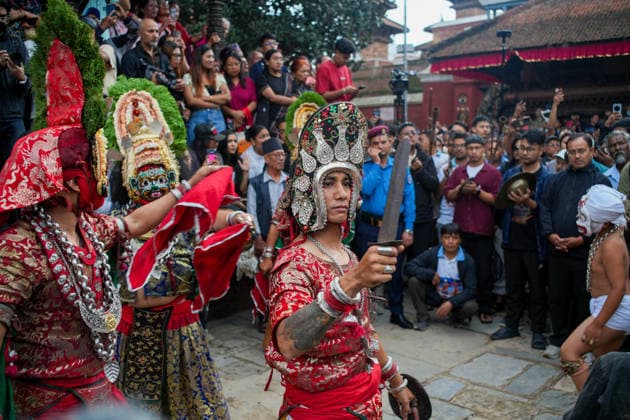 Indra Jatra Festival Started - Kathmandu Devotees perform a traditional God Dance as the sacred ceremonial wooden pole known as Ya: Shi is erected at Hanuman Dhoka Durbar Square, marking the beginning of the eight-day Indra Jatra festival in Kathmandu, Nepal, on September 23, 2026. The annual festival, one of the biggest celebrations in the Kathmandu Valley, is dedicated to Indra, the Hindu god of rain and heaven, and features traditional chariot processions, masked dances, religious rituals and cultural performances. The festival also includes processions of the living goddess Kumari through the historic streets of Kathmandu. Photo by Sunil Pradhan ABACAPRESS.COM Kathmandu Bagmati Nepal  Copyright: xSuniixPradhan ABACAx