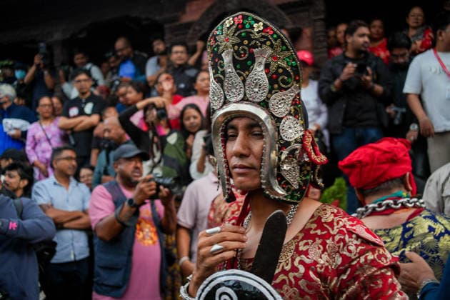 Indra Jatra Festival Started - Kathmandu Devotees perform a traditional God Dance as the sacred ceremonial wooden pole known as Ya: Shi is erected at Hanuman Dhoka Durbar Square, marking the beginning of the eight-day Indra Jatra festival in Kathmandu, Nepal, on September 23, 2026. The annual festival, one of the biggest celebrations in the Kathmandu Valley, is dedicated to Indra, the Hindu god of rain and heaven, and features traditional chariot processions, masked dances, religious rituals and cultural performances. The festival also includes processions of the living goddess Kumari through the historic streets of Kathmandu. Photo by Sunil Pradhan ABACAPRESS.COM Kathmandu Bagmati Nepal  Copyright: xSuniixPradhan ABACAx