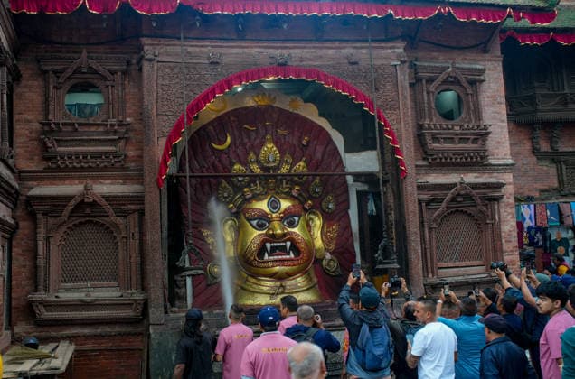 Indra Jatra Festival Started - Kathmandu Devotees clean the idol of Swet Bhairav on the first day of the eight-day Indra Jatra festival at Hanuman Dhoka Durbar Square in Kathmandu, Nepal, on September 23, 2026. The annual festival, one of the biggest celebrations in the Kathmandu Valley, is dedicated to Indra, the Hindu god of rain and heaven, and features traditional chariot processions, masked dances, religious rituals and cultural performances. The festival also includes processions of the living goddess Kumari through the historic streets of Kathmandu. Photo by Sunil Pradhan ABACAPRESS.COM Kathmandu Bagmati Nepal  Copyright: xSuniixPradhan ABACAx