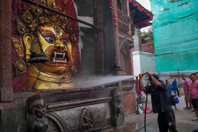 Indra Jatra Festival Started - Kathmandu Devotees clean the idol of Swet Bhairav on the first day of the eight-day Indra Jatra festival at Hanuman Dhoka Durbar Square in Kathmandu, Nepal, on September 23, 2026. The annual festival, one of the biggest celebrations in the Kathmandu Valley, is dedicated to Indra, the Hindu god of rain and heaven, and features traditional chariot processions, masked dances, religious rituals and cultural performances. The festival also includes processions of the living goddess Kumari through the historic streets of Kathmandu. Photo by Sunil Pradhan ABACAPRESS.COM Kathmandu Bagmati Nepal  Copyright: xSuniixPradhan ABACAx