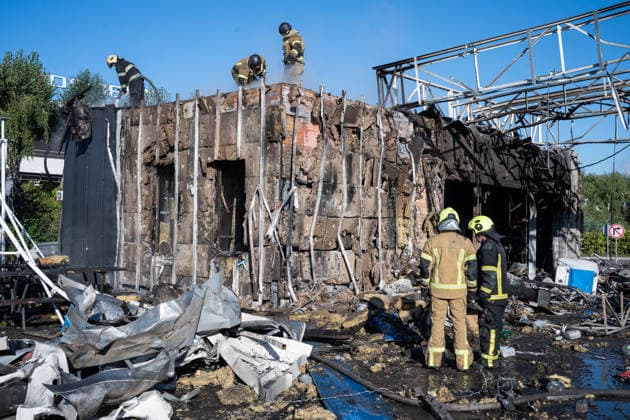 Gas station and business center destroyed in Russian attack on Kyiv KYIV, UKRAINE - SEPTEMBER 23: Emergency rescue workers and municipal response teams inspect and clear the debris of a heavily damaged gas station and business center following Russian air and missile strikes across Kyiv, Ukraine on September 23, 2026. Authorities reported multiple blast sites and extensive structural damage across several districts in the capital, with emergency services deployed to contain fires, secure compromised buildings, and clear wreckage. Danylo Antoniuk Anadolu Kyiv Ukraine. Editorial use only. Please get in touch for any other usage.  Copyright: x2026xAnadoluxDanyloxAntoniukx