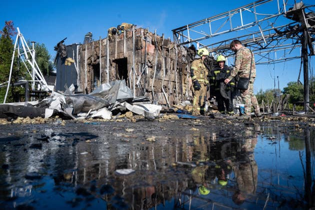 Gas station and business center destroyed in Russian attack on Kyiv KYIV, UKRAINE - SEPTEMBER 23: Emergency rescue workers and municipal response teams inspect and clear the debris of a heavily damaged gas station and business center following Russian air and missile strikes across Kyiv, Ukraine on September 23, 2026. Authorities reported multiple blast sites and extensive structural damage across several districts in the capital, with emergency services deployed to contain fires, secure compromised buildings, and clear wreckage. Danylo Antoniuk Anadolu Kyiv Ukraine. Editorial use only. Please get in touch for any other usage.  Copyright: x2026xAnadoluxDanyloxAntoniukx