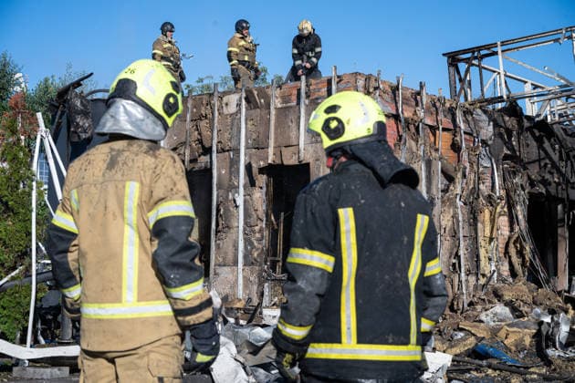 Gas station and business center destroyed in Russian attack on Kyiv KYIV, UKRAINE - SEPTEMBER 23: Emergency rescue workers and municipal response teams inspect and clear the debris of a heavily damaged gas station and business center following Russian air and missile strikes across Kyiv, Ukraine on September 23, 2026. Authorities reported multiple blast sites and extensive structural damage across several districts in the capital, with emergency services deployed to contain fires, secure compromised buildings, and clear wreckage. Danylo Antoniuk Anadolu Kyiv Ukraine. Editorial use only. Please get in touch for any other usage.  Copyright: x2026xAnadoluxDanyloxAntoniukx