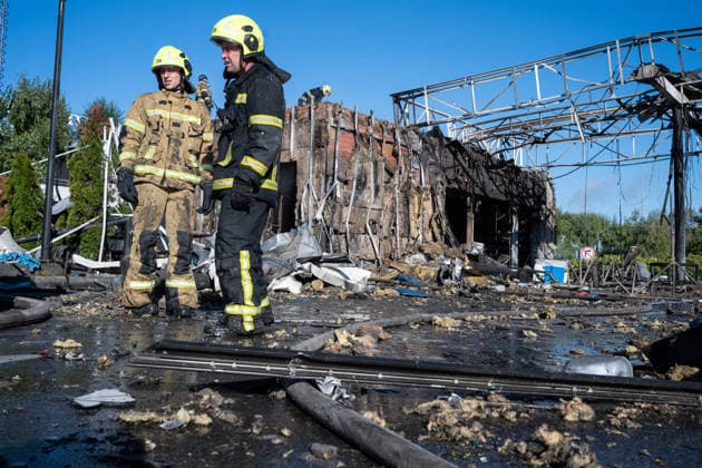 Gas station and business center destroyed in Russian attack on Kyiv KYIV, UKRAINE - SEPTEMBER 23: Emergency rescue workers and municipal response teams inspect and clear the debris of a heavily damaged gas station and business center following Russian air and missile strikes across Kyiv, Ukraine on September 23, 2026. Authorities reported multiple blast sites and extensive structural damage across several districts in the capital, with emergency services deployed to contain fires, secure compromised buildings, and clear wreckage. Danylo Antoniuk Anadolu Kyiv Ukraine. Editorial use only. Please get in touch for any other usage.  Copyright: x2026xAnadoluxDanyloxAntoniukx