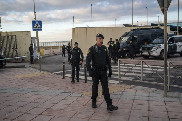 Spanish security forces reinforce Ceuta border amid mass crossing alerts CEUTA, SPAIN - SEPTEMBER 23: Members of the Spanish Civil Guard s Rapid Action Group (GRS) and National Police riot units maintain strict security vigilance along the Tarajal border crossing in the autonomous city of Ceuta, Spain on September 23, 2026. Following social media calls inciting a coordinated mass border-crossing attempt into European territory, the Spanish government deployed specialized reinforcement units from across mainland Spain to heighten border monitoring and prevent irregular entry attempts from neighboring Morocco amid the ongoing regional migration crisis. Jose Colon Anadolu Ceuta Spain. Editorial use only. Please get in touch for any other usa  Copyright: x2026xAnadoluxJosexColonx