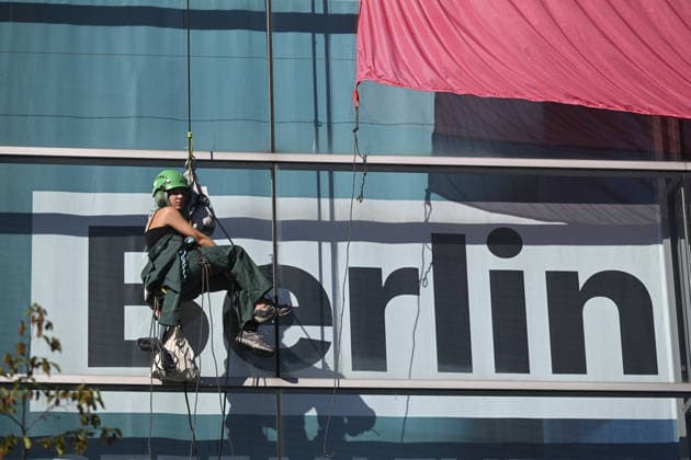 Environmental activists protest at CDU headquarters in Berlin BERLIN, GERMANY - SEPTEMBER 23: Environmental activists stage a protest at the Christian Democratic Union (CDU) headquarters, displaying banners on the building facade, in Berlin, Germany, on September 23, 2026. ROBIN WOOD activists climbed the CDU headquarters and unfurled the banner, criticizing the CDU-led federal government over what they described as insufficient action on climate protection and a lack of measures to counter the rise of the far-right Alternative for Germany (AfD). Halil Sagirkaya Anadolu Berlin Germany. Editorial use only. Please get in touch for any other usage.  Copyright: x2026xAnadoluxHalilxSagirkayax