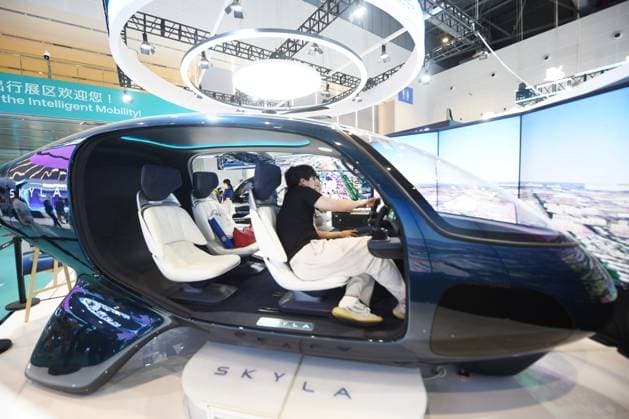 5th Global Digital Trade Expo in Hangzhou Spectators experience flying in the smart cockpit of the tilt rotor electric vertical takeoff and landing aircraft (eVTOL) at the 5th Global Digital Trade Expo in Hangzhou, Zhejiang Province, China on September 23, 2026. Hangzhou Zhejiang China  Copyright: xCFOTOx i1790192366832