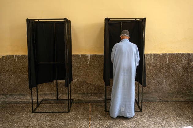 September 23, 2026, Essaouira, Morocco: A man votes behind a curtain at a polling station during parliamentary elections in Essaouira, Morocco. Essaouira Morocco  - ZUMAz174 20260923_zip_z174_008 Copyright: xMoexZoyarix