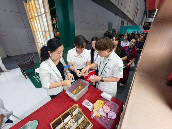 (260923) -- SHANGHAI, Sept. 23, 2026 -- Visitors make herbal sachets at the booth of Guang anmen Hospital during the WorldSkills Shanghai 2026 Expo in east China s Shanghai, Sept. 23, 2026. The expo kicked off here on Wednesday. ) CHINA-SHANGHAI-WORLDSKILLS SHANGHAI 2026 EXPO (CN) XingxGuangli 