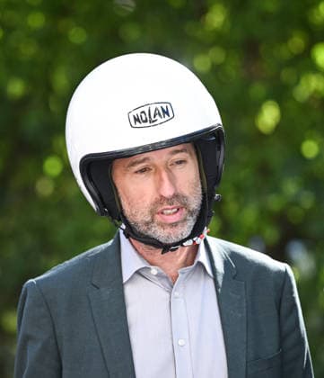 Tübingen, September 23, 2026: Mayor Boris Palmer, an independent, wearing a helmet before a test ride on an e-scooter