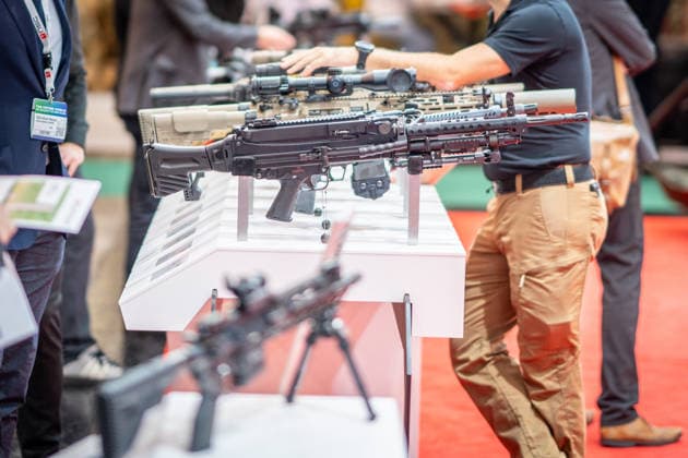 A view of the exhibition halls and the fairgrounds; the Heckler & Koch booth featuring handguns and machine guns; the Euro Defense Expo 2026 defense trade show in Essen, Germany; Essen, North Rhine-Westphalia, Germany; the fairgrounds