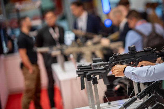 A view of the exhibition halls and the fairgrounds; the Heckler & Koch booth featuring handguns and machine guns; the Euro Defense Expo 2026 defense trade show in Essen, Germany; Essen, North Rhine-Westphalia, Germany; the fairgrounds