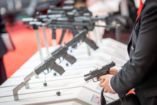 A view of the exhibition halls and the fairgrounds; the Heckler & Koch booth featuring handguns and machine guns; the Euro Defense Expo 2026 defense trade show in Essen, Germany; Essen, North Rhine-Westphalia, Germany; the fairgrounds